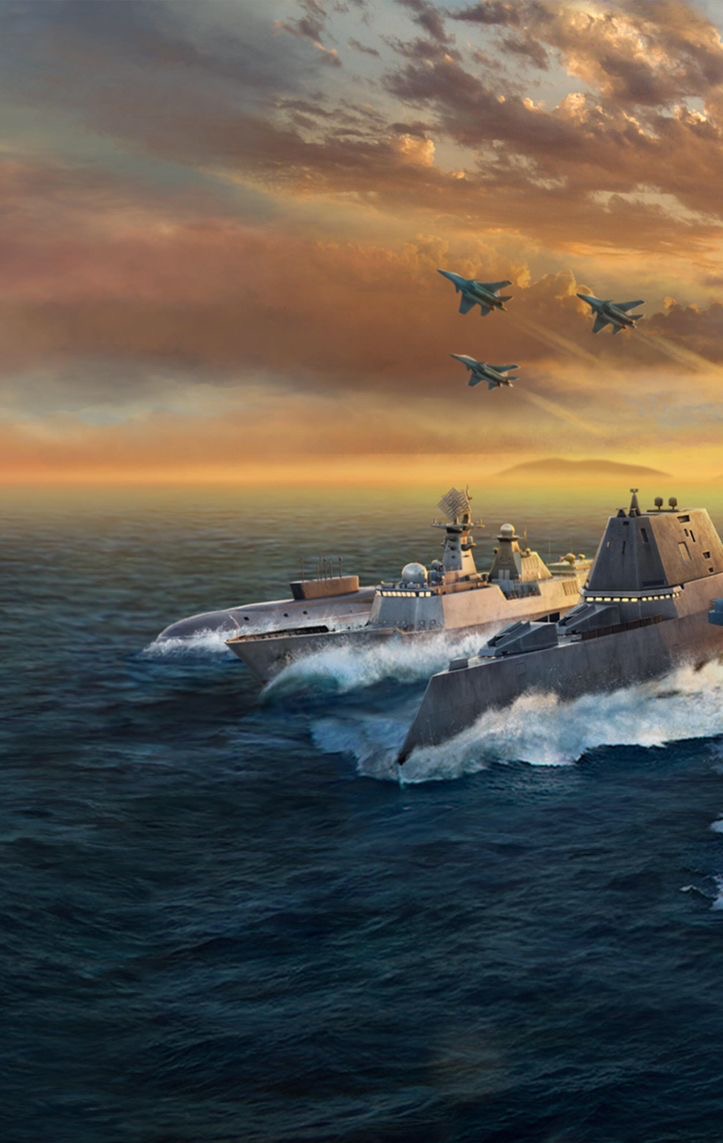 Warships and jets at sunset